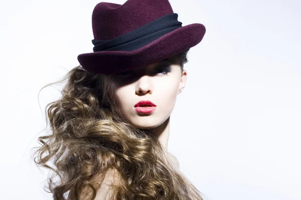 Beautiful young model in hat Royalty Free Stock Images