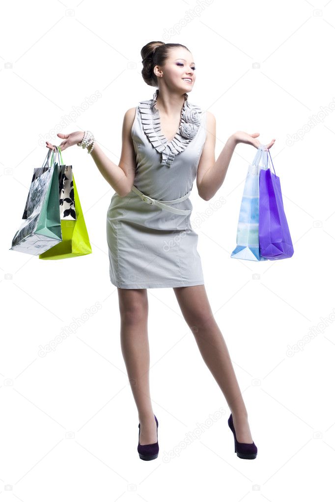 Young beautiful women with her shopping bags