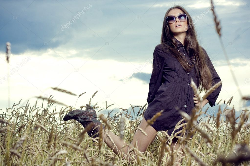 Young woman in the meadow