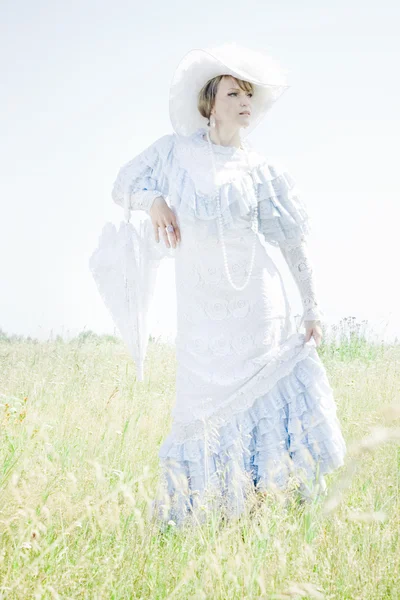 Beautiful woman in vintage dress — Stock Photo, Image