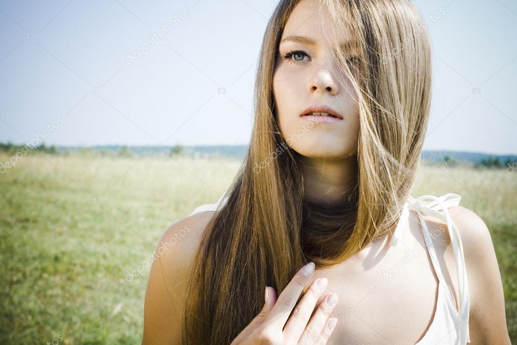 Beautiful girl with luxuriant hair