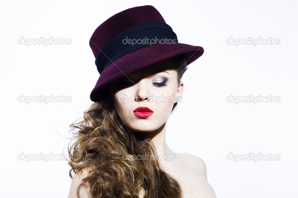 Beautiful young model in hat