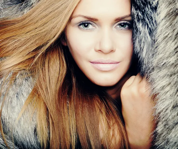 Pretty woman with fur — Stock Photo, Image