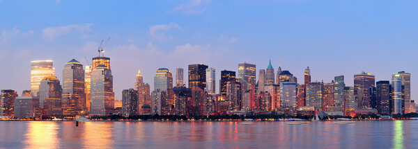 New York City Manhattan downtown skyline at sunset over Hudson River panorama