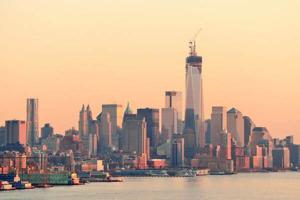 New York City downtown Manhattan at sunset with skyline panorama view over Hudson River