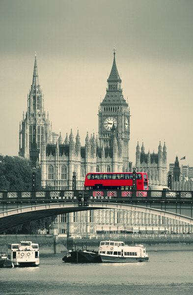 Big Ben, House of Parliament and Lambeth Bridge with red bus in London.