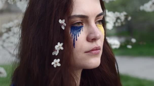 Young Attractive Girl Portrait Ukrainian Flag Spring Cherry Garden — Stockvideo