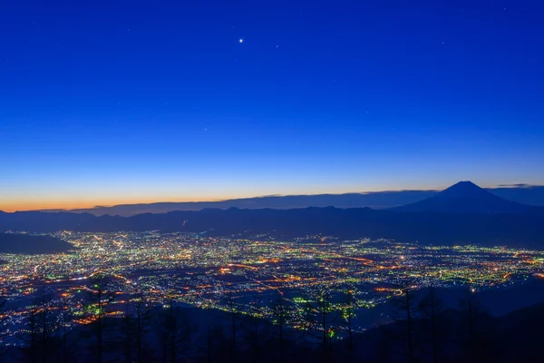 Vista nocturna de la ciudad de Kofu y el Monte Fuji — Foto de Stock