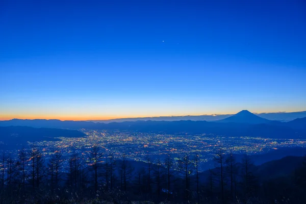 Vista notturna della città di Kofu e del Monte Fuji — Foto Stock