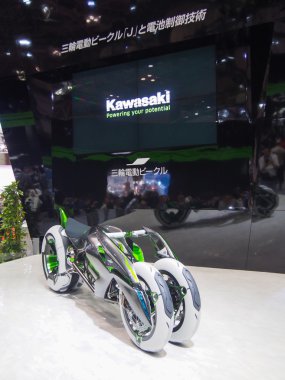 TOKYO, JAPAN - November 23, 2013: Booth at Kawasaki Motorcycles clipart