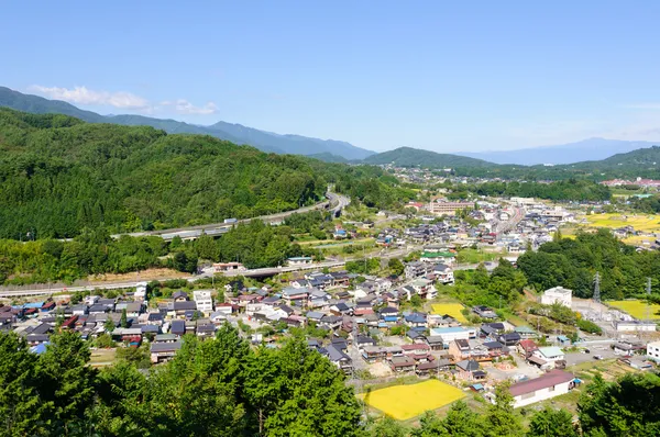 Landschap van achi dorp in zuidelijke nagano, japan — Stockfoto