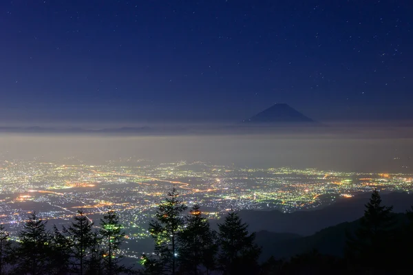 Vista nocturna de la ciudad de Kofu y el Monte Fuji — Foto de Stock