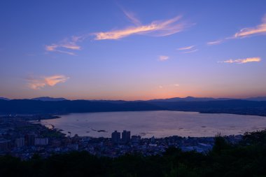 Night view of the city of Suwa clipart