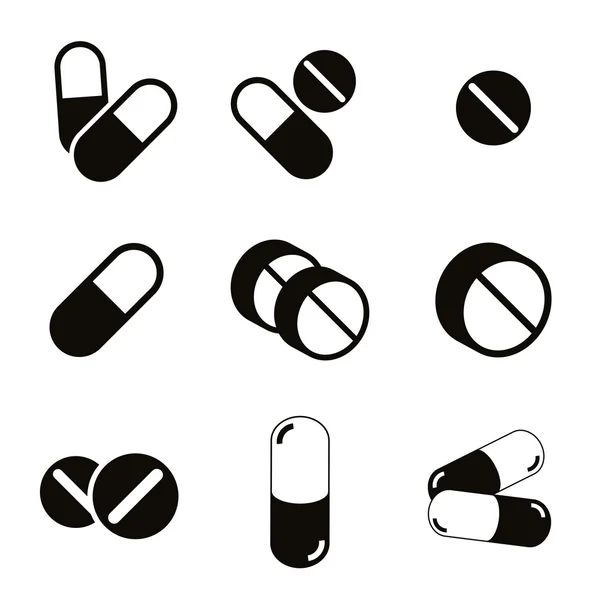 Pills and capsules icon set. — Stock Vector