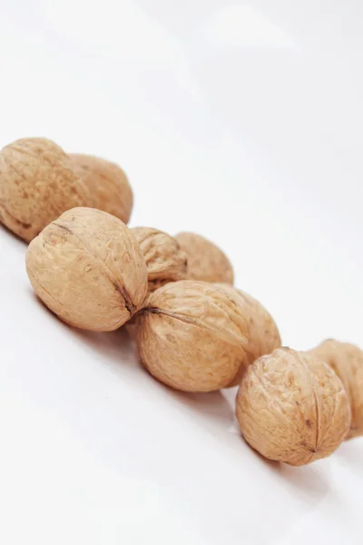 Walnuts on a white background — Stock Photo, Image