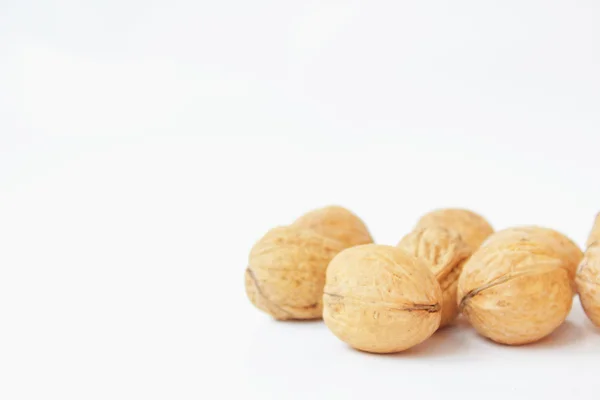 Walnuts on a white background — Stock Photo, Image