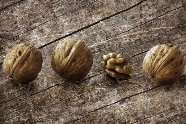 Walnuts on the background of wooden boards — Stock Photo, Image