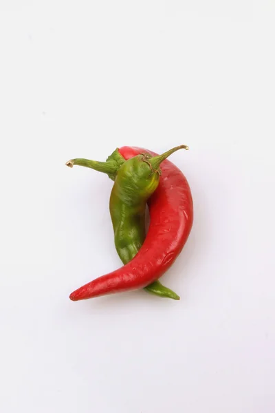 Röd och grön paprika — Stockfoto