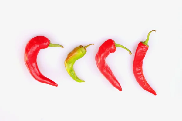 Pimientos rojos sobre fondo blanco —  Fotos de Stock