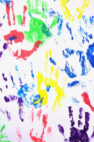 Beyaz arka plan üzerinde renkli el izleri — Stok fotoğraf