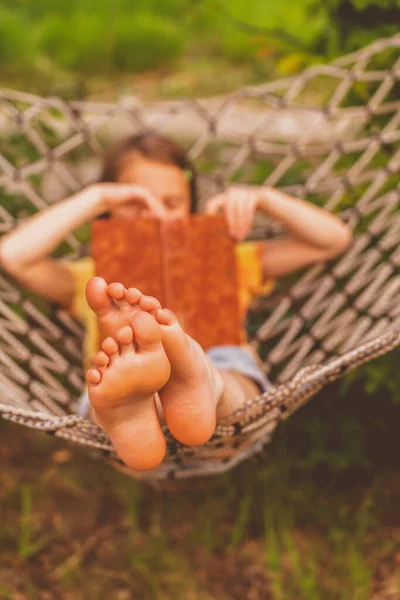 Young Beautiful Girl Lies Hammock Reads Book Rest Summer Vacation — Stockfoto