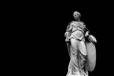 Goddess of wisdom and victory Athena holds the winner's warrior in her hand. Copy space for text.