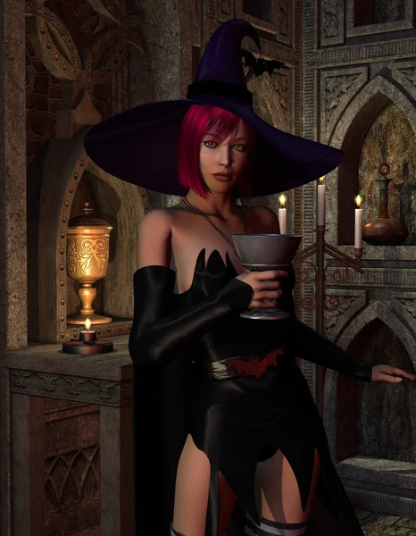 Hexe mit einer Tasse Stockbild