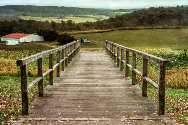 Bridge to the farm — Stock Photo, Image