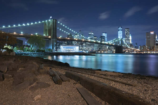 Night scene of the Brooklyn bridge and Manhattan skyline, New York City on October 27th, 2013 in New York City, USA