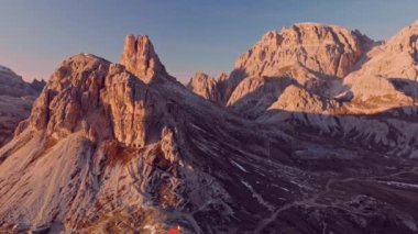 Aerial Flying Near Tre Cime Di Lavaredo Nature Park Mountains In Dolomites Italy At Sunset