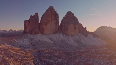 Aerial Flying Near Tre Cime Di Lavaredo Nature Park Mountains In Dolomites Italy At Sunset