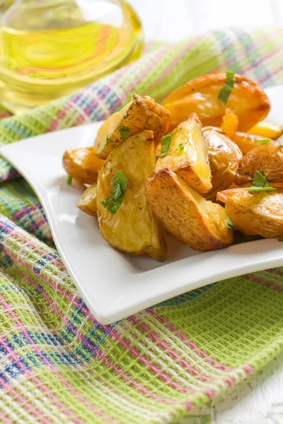 Baked potatoes with parsley — Stock Photo, Image