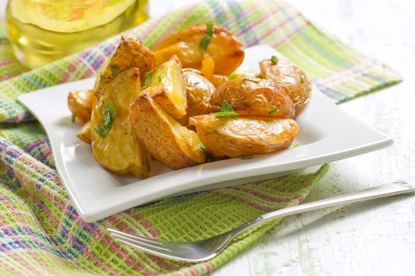 Baked potatoes with parsley — Stock Photo, Image