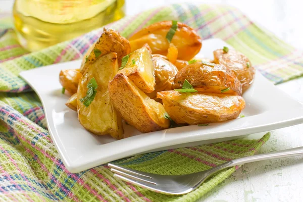 Baked potatoes with parsley — Stock Photo, Image