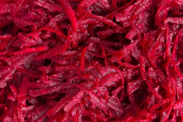 Raw grated beet background — Stock Photo, Image