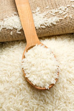 Rice with wooden spoon