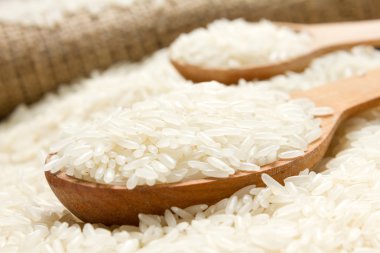 Rice with wooden spoon