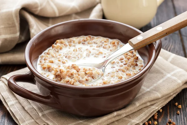 Buckwheat and milk — Stock Photo, Image