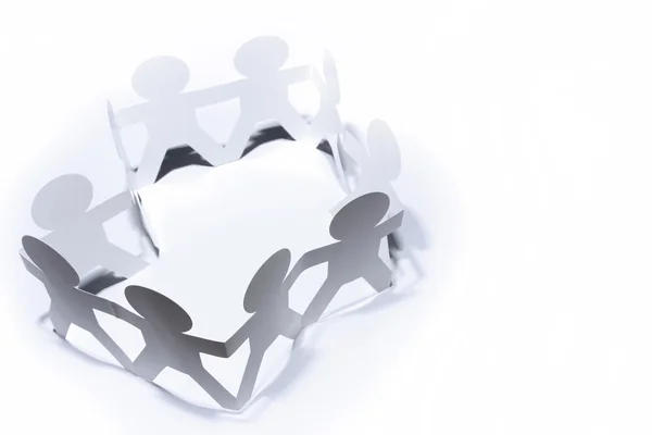 Team of paper doll in a circle — Stock Photo, Image
