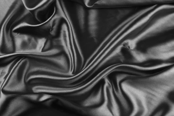 Closeup of folds in black silk fabric — Stock Photo, Image