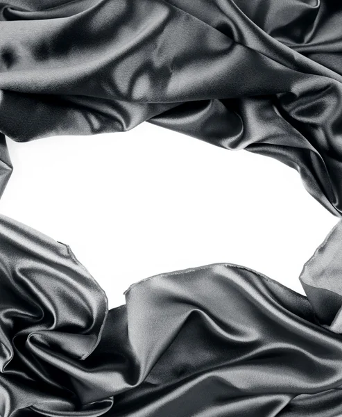 Closeup of folds in black silk fabric — Stock Photo, Image