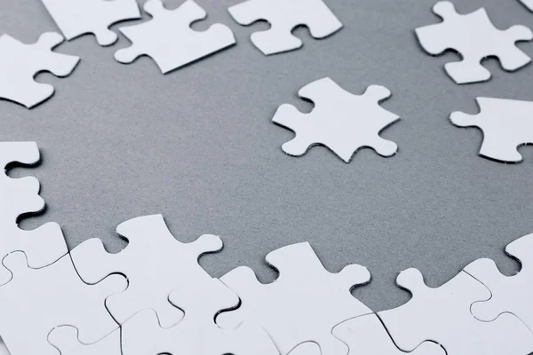 Jigsaw puzzle pieces — Stock Photo, Image