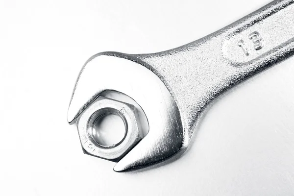 Spanner and nut — Stock Photo, Image