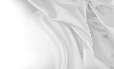 Dalgalanan beyaz ipek kumaş çizgilerinin yakın çekimi