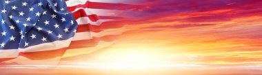 American flag in sunny sky. Wide web header banner