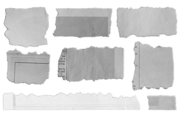 Düz Arkaplanda Sekiz Parça Yırtık Kağıt — Stok fotoğraf