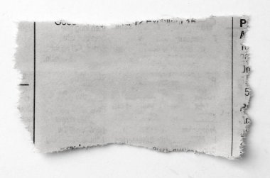 Bir parça yırtık beyaz kağıt. 