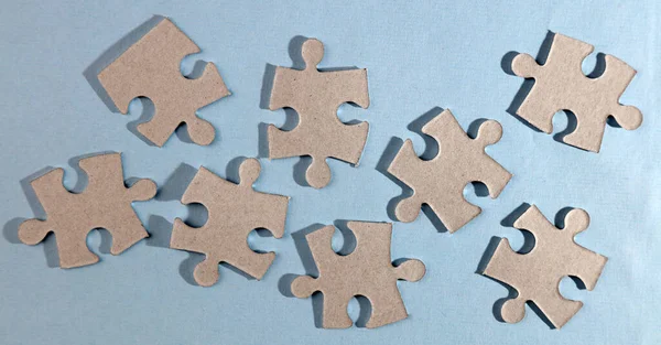 Eight Jigsaw Puzzle Pieces Apart — Stock Photo, Image