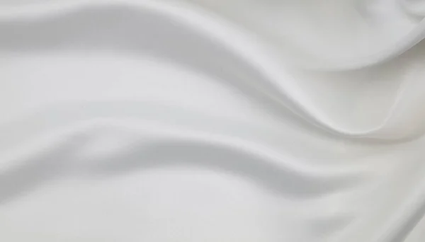 波打つような白い絹織物の質感のクローズアップ背景 — ストック写真