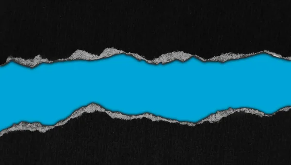 Papel Negro Rasgado Sobre Fondo Azul Espacio Para Copia —  Fotos de Stock